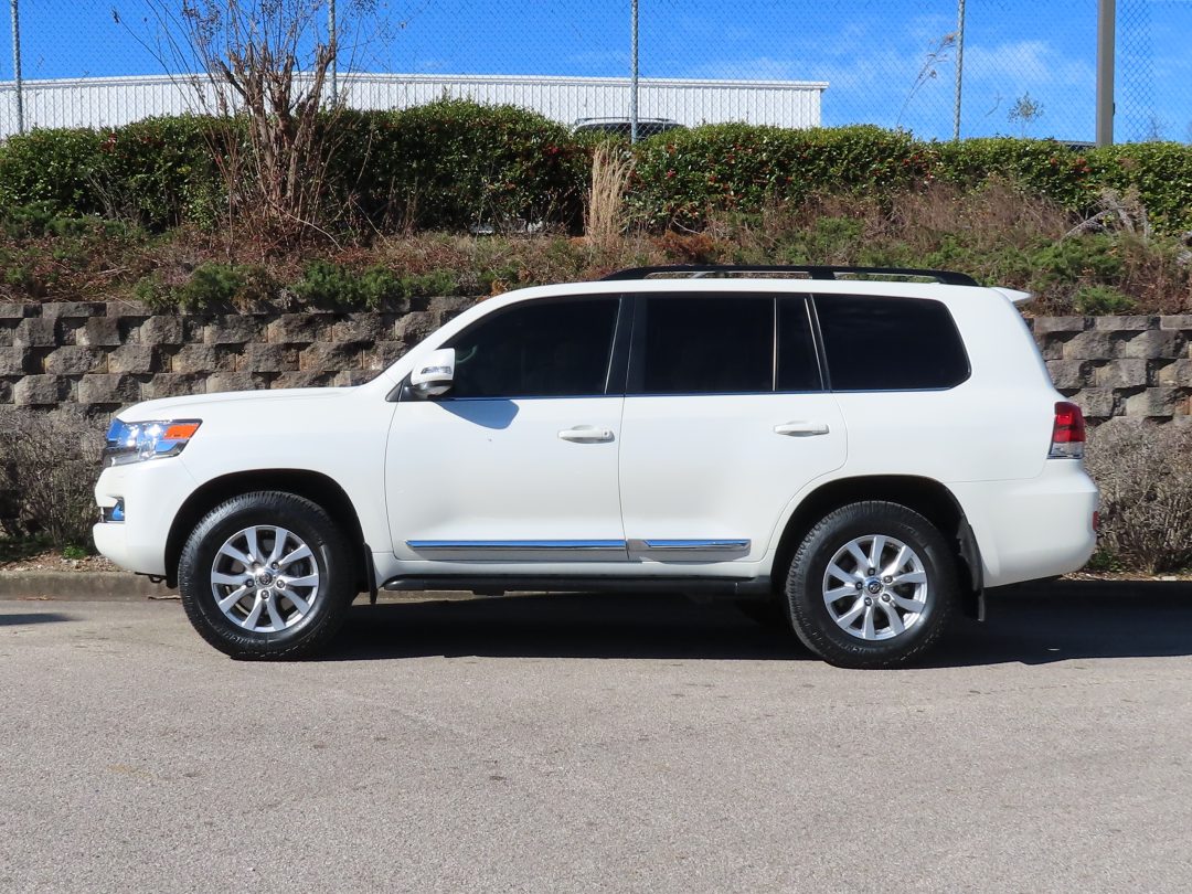 Side view of the Toyota Land Cruiser white color car