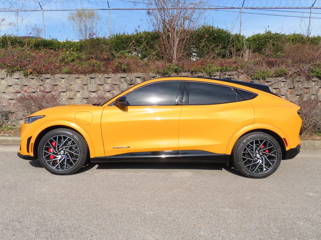 Yellow mustang with tinted windows